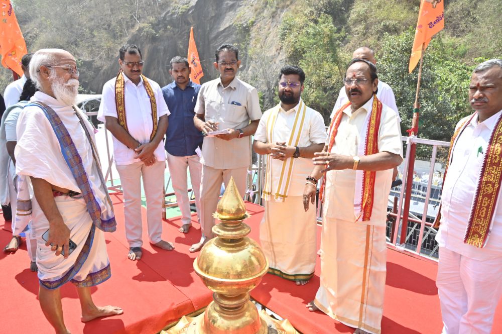 A grand spiritual ceremony was held for the unveiling of the Anjaneya Swami flag at the Sri Durga Malleshwara Swamy Temple.